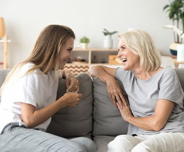 Ladies converse on couch