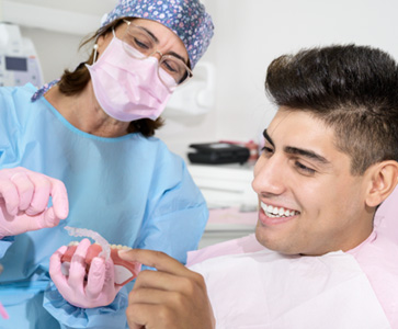 Patient in Los Angeles talking to dentist about Invisalign