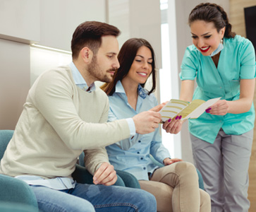 Patient in Los Angeles talking to dental team about Invisalign