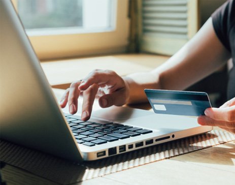 Woman using a credit card