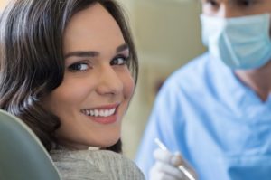 patient smiling after getting a smile makeover